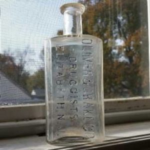 Antique glass pharmaceutical bottle